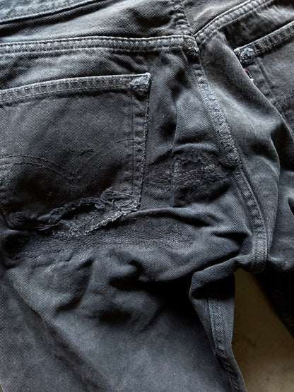 2000’s Thrashed & Repaired Levi’s Jeans